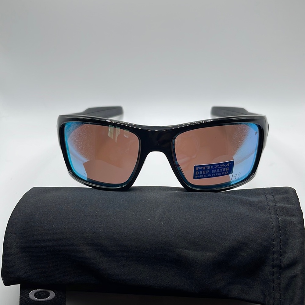 NWOT. Men’s Turbine Oakley Sunglasses. Black frames with Deep Water Prizm lens.